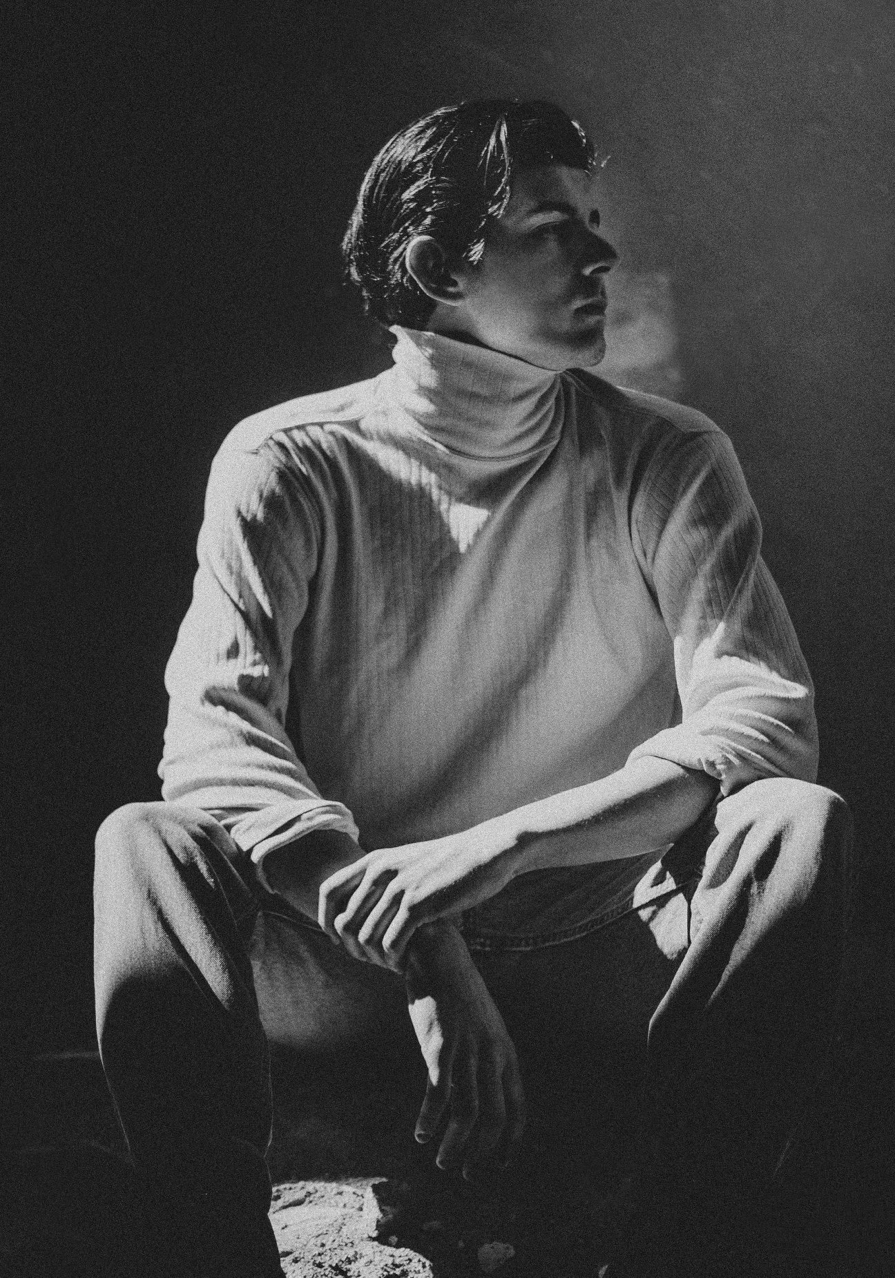 Portrait — man in turtleneck, black and white