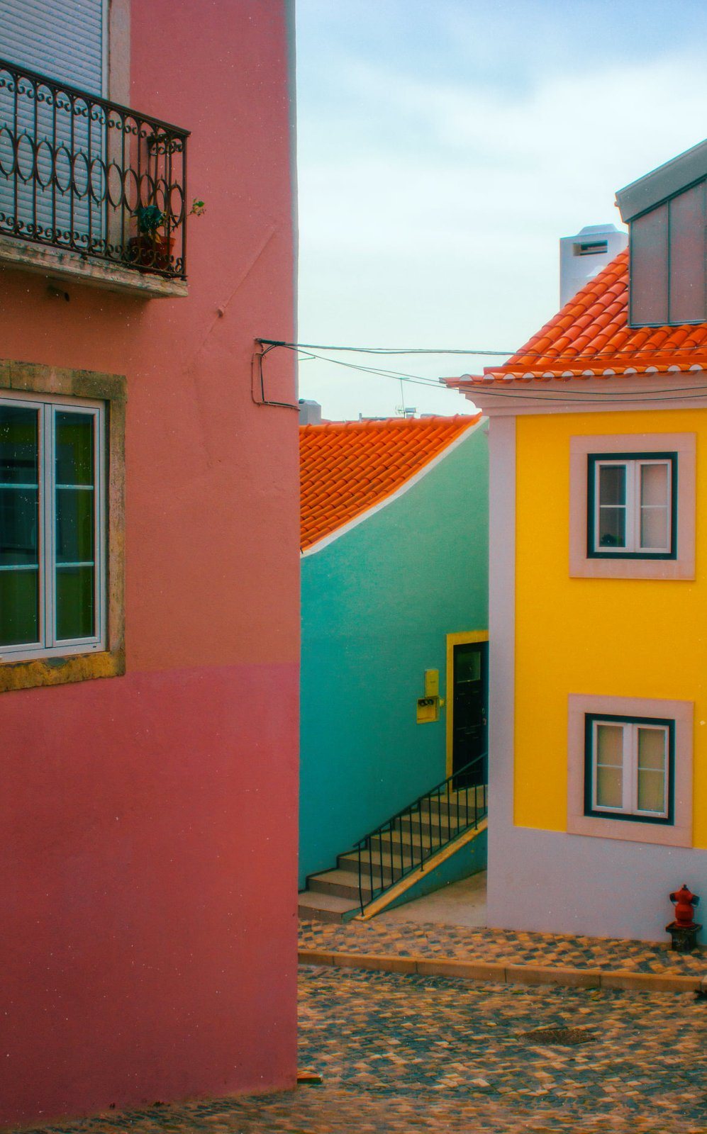 Pink, mint and yellow houses in Lisbon