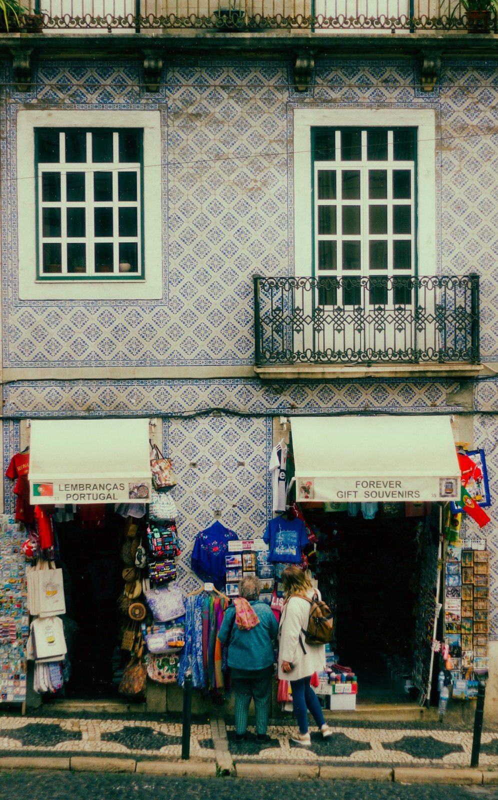 Souvenir shops under azulejo tiles, Lisbon