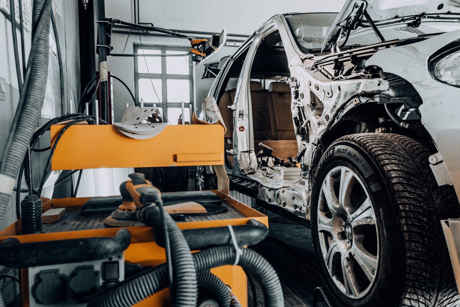 Body shop with a stripped SUV